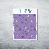 Purple and green triangles and purple dots fabric