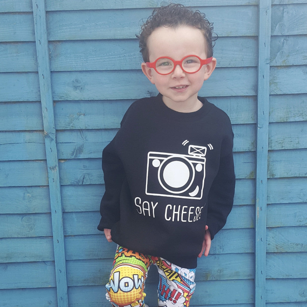 'Say cheese' kids sweater