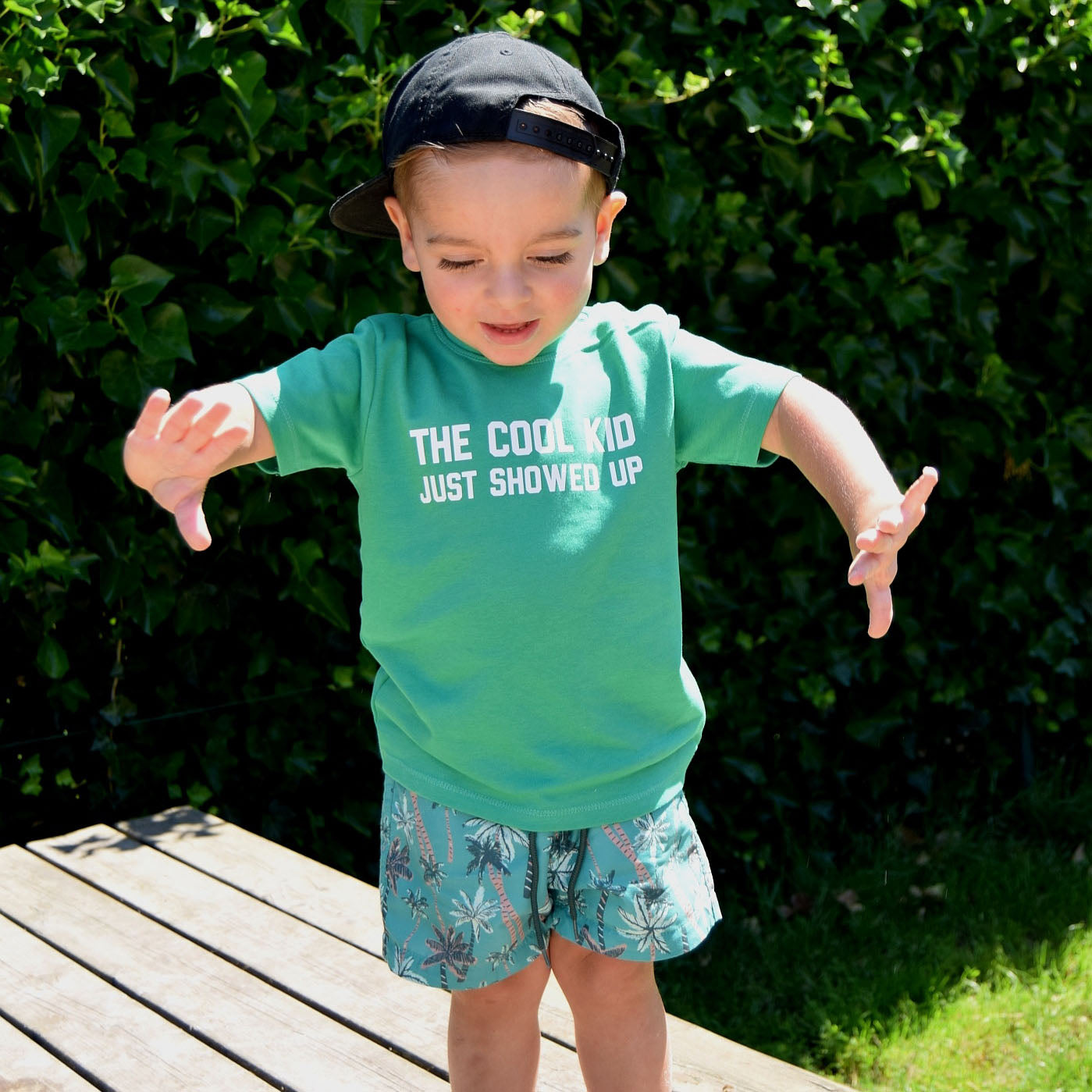 'The cool kid just showed up' baby shortsleeve shirt