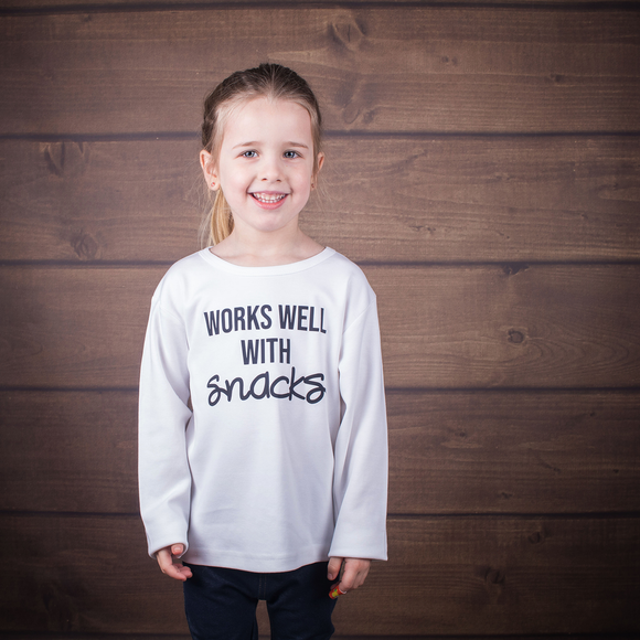 'Works well with snacks' kids longsleeve shirt