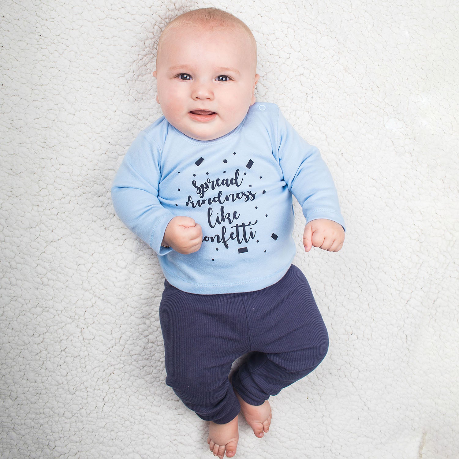 'Spread kindness like confetti' baby longsleeve shirt