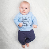 'Spread kindness like confetti' baby longsleeve shirt