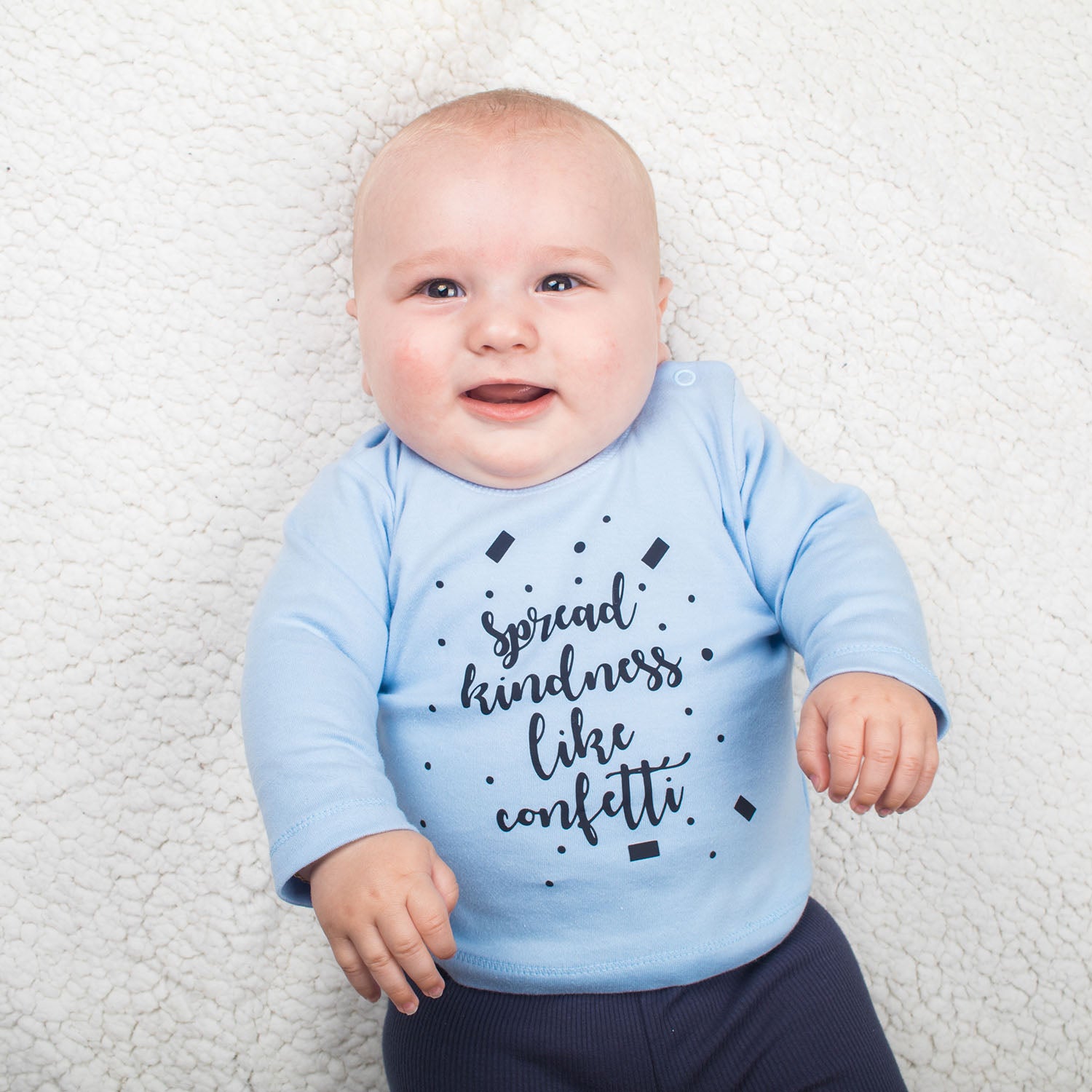 'Spread kindness like confetti' baby longsleeve shirt