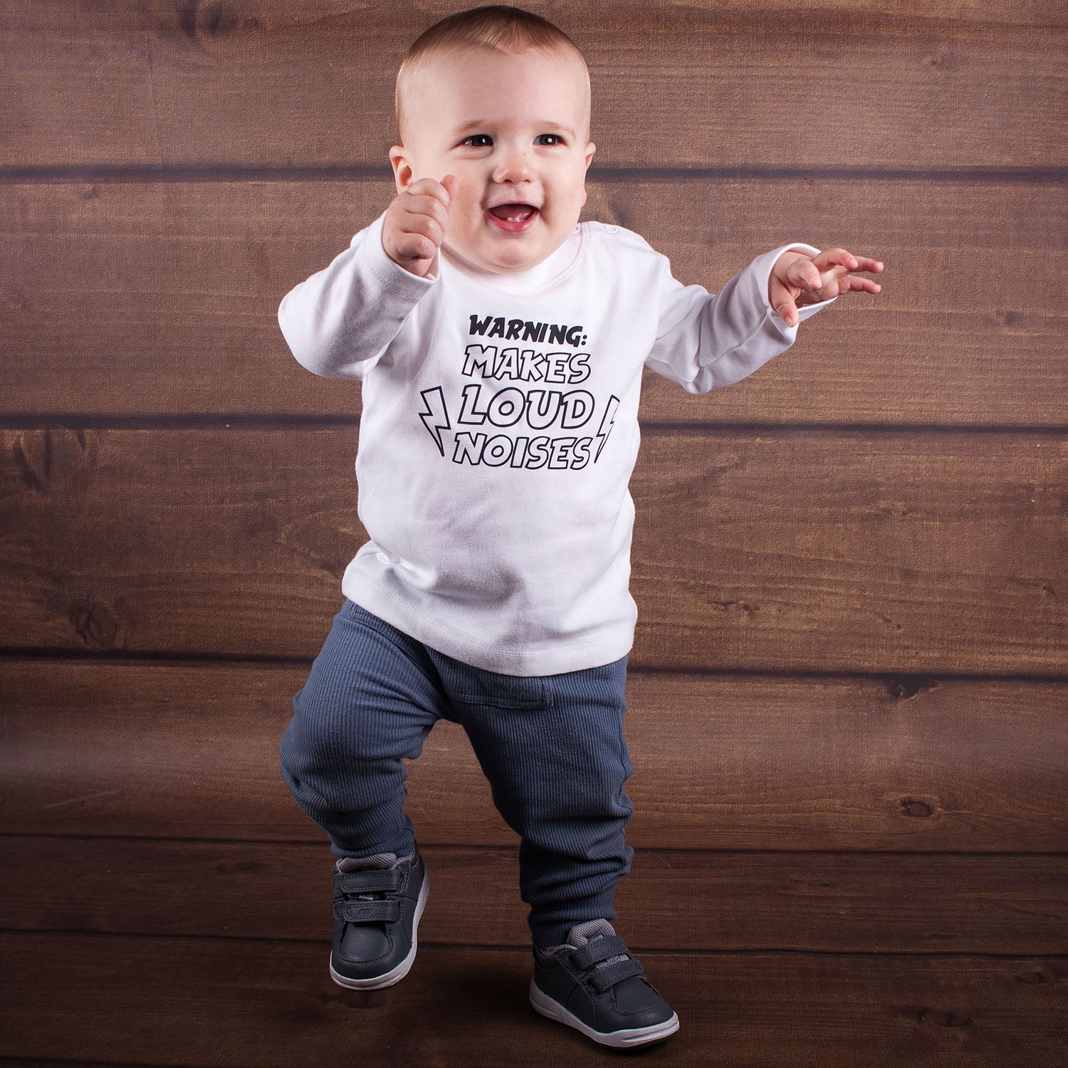 'Warning: makes loud noises' baby longsleeve shirt