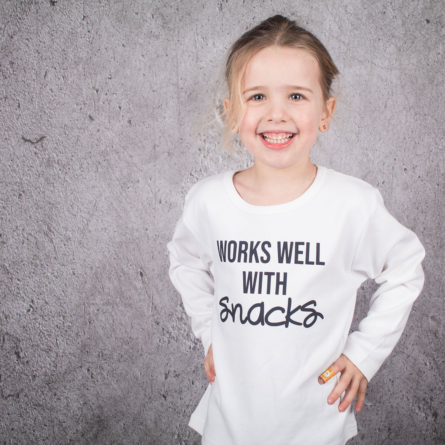 'Works well with snacks' kids longsleeve shirt