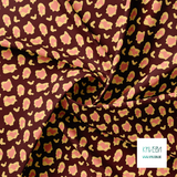 Pink and yellow leopard print fabric