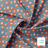 Pink and orange leopard print fabric