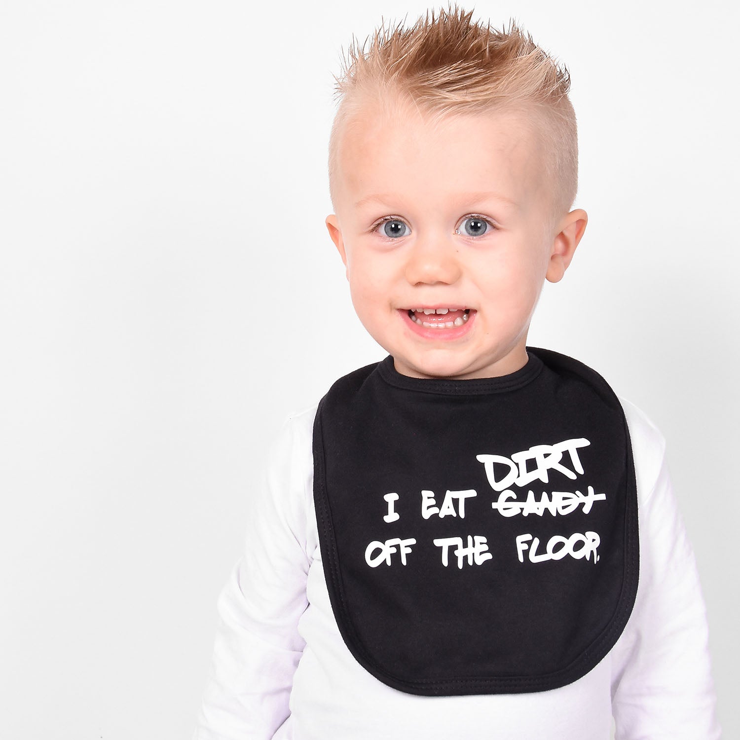 'I eat candy/dirt off the floor' baby bib