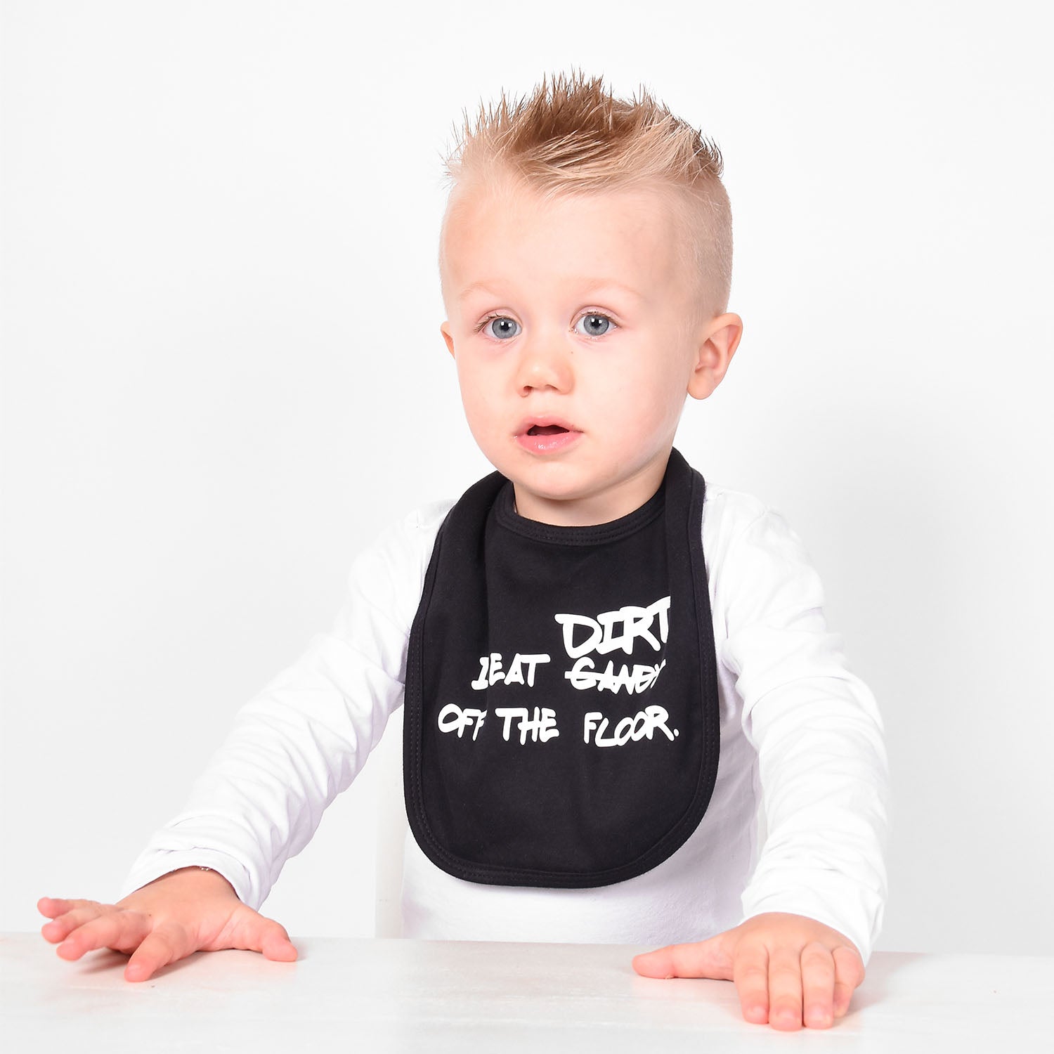 'I eat candy/dirt off the floor' baby bib