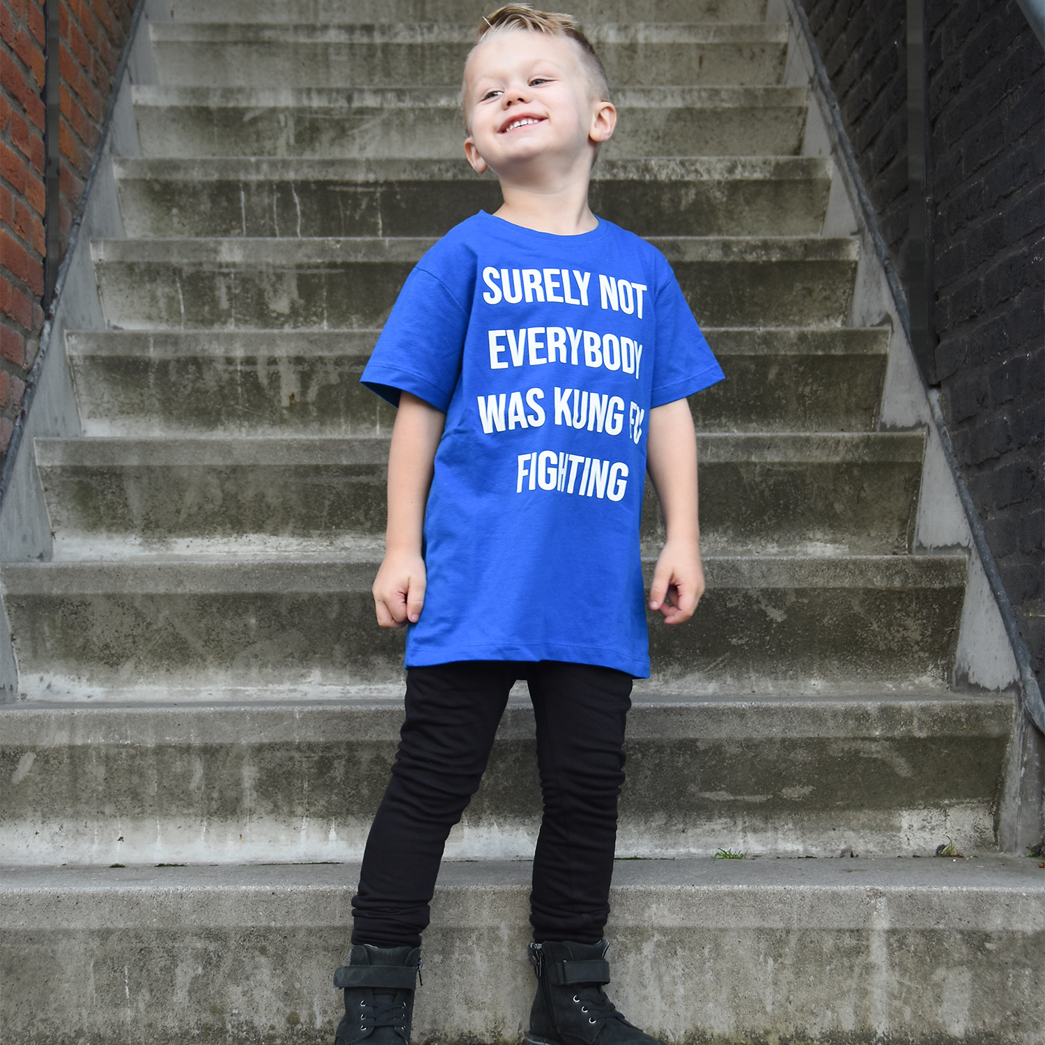 'Surely not everybody was kung fu fighting' kids shortsleeve shirt