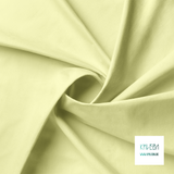 Solid pastel yellow fabric