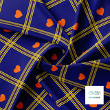 Yellow and purple plaid with orange hearts fabric