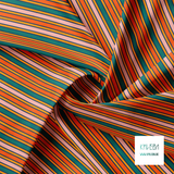 Orange, pink and green vertical stripes fabric