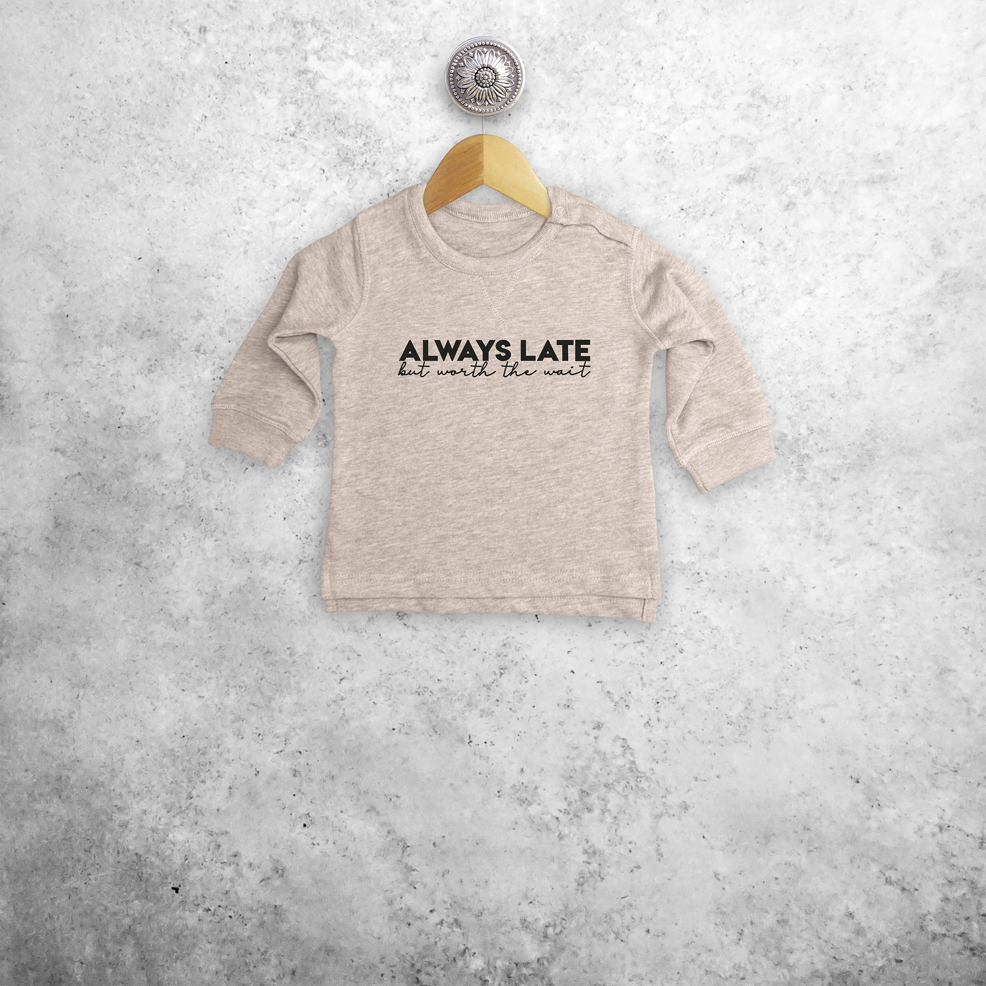 'Always late, but worth the wait' baby sweater