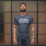 'Don't follow in my footsteps. I run into walls.' adult shirt