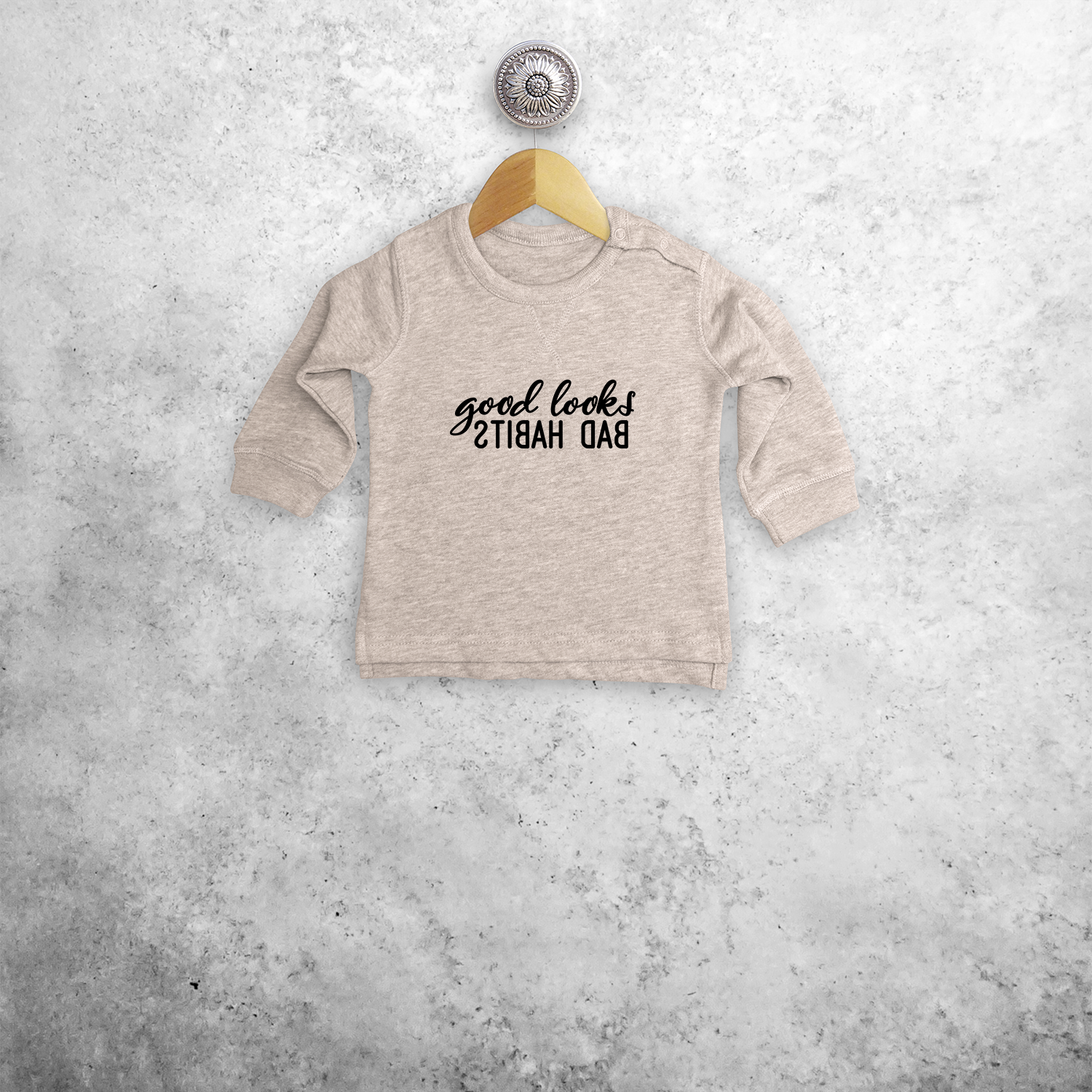 'Good looks - Bad habits' baby sweater