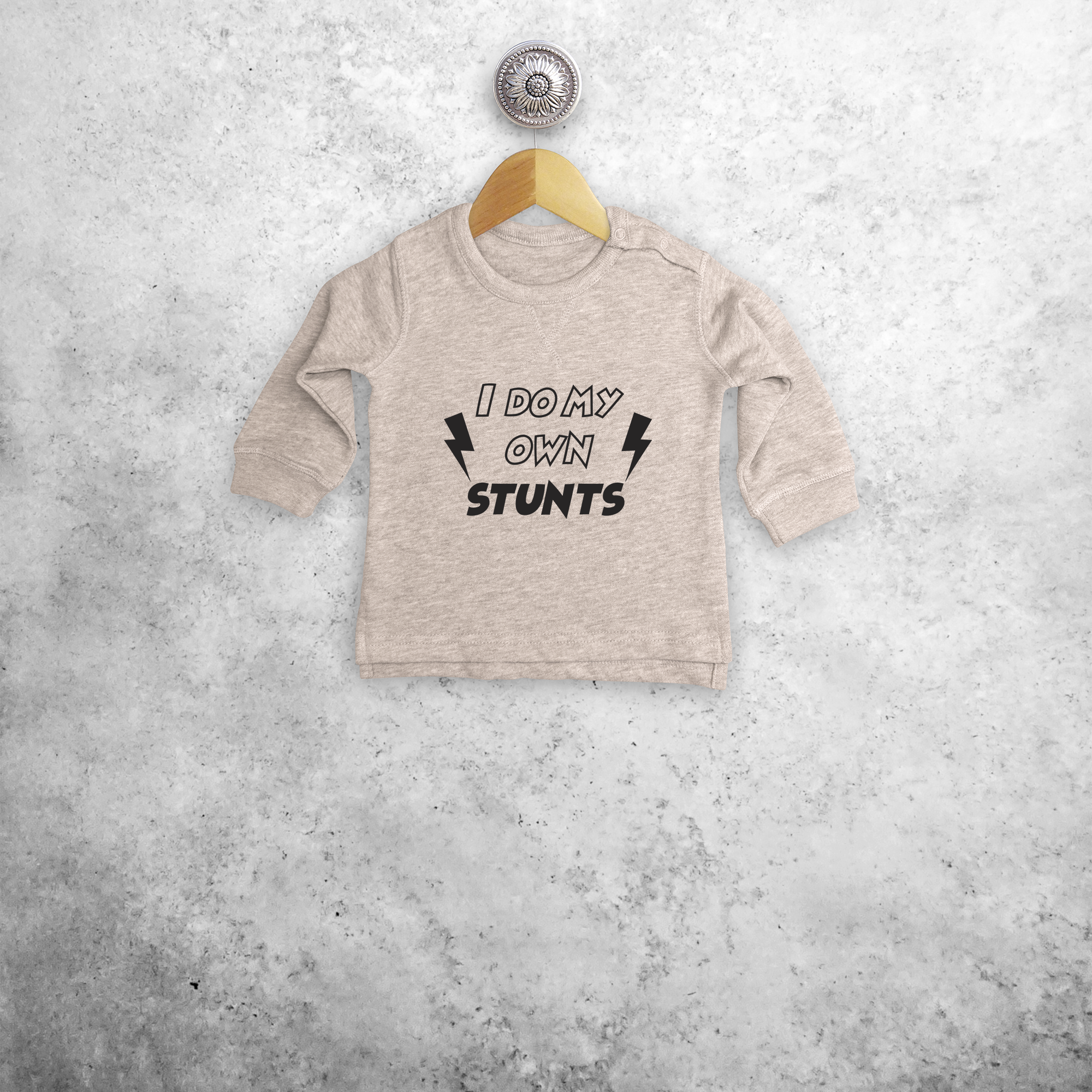 'I do my own stunts' baby sweater