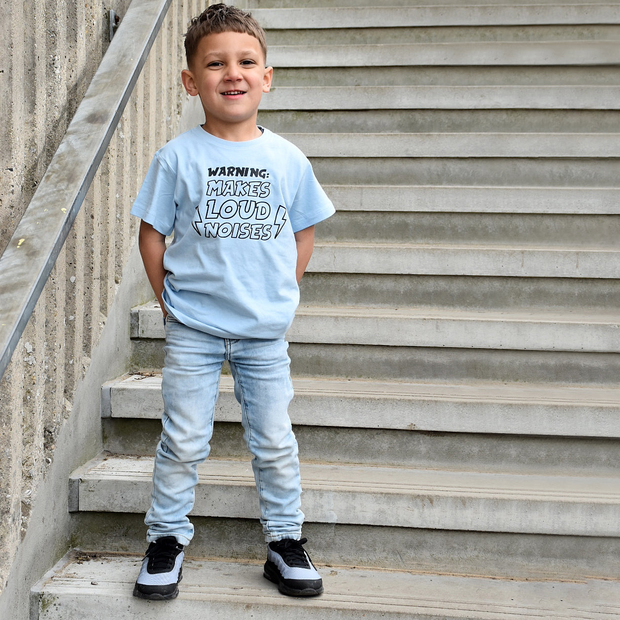 'Warning: makes loud noises' kids shortsleeve shirt