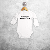 Baby or toddler bodysuit with long sleeves, with ‘I’m having a meltdown’ print by KMLeon.