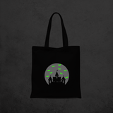 Castle and bats glow in the dark tote bag