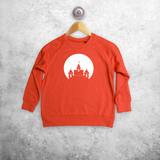 Castle and bats glow in the dark kids sweater