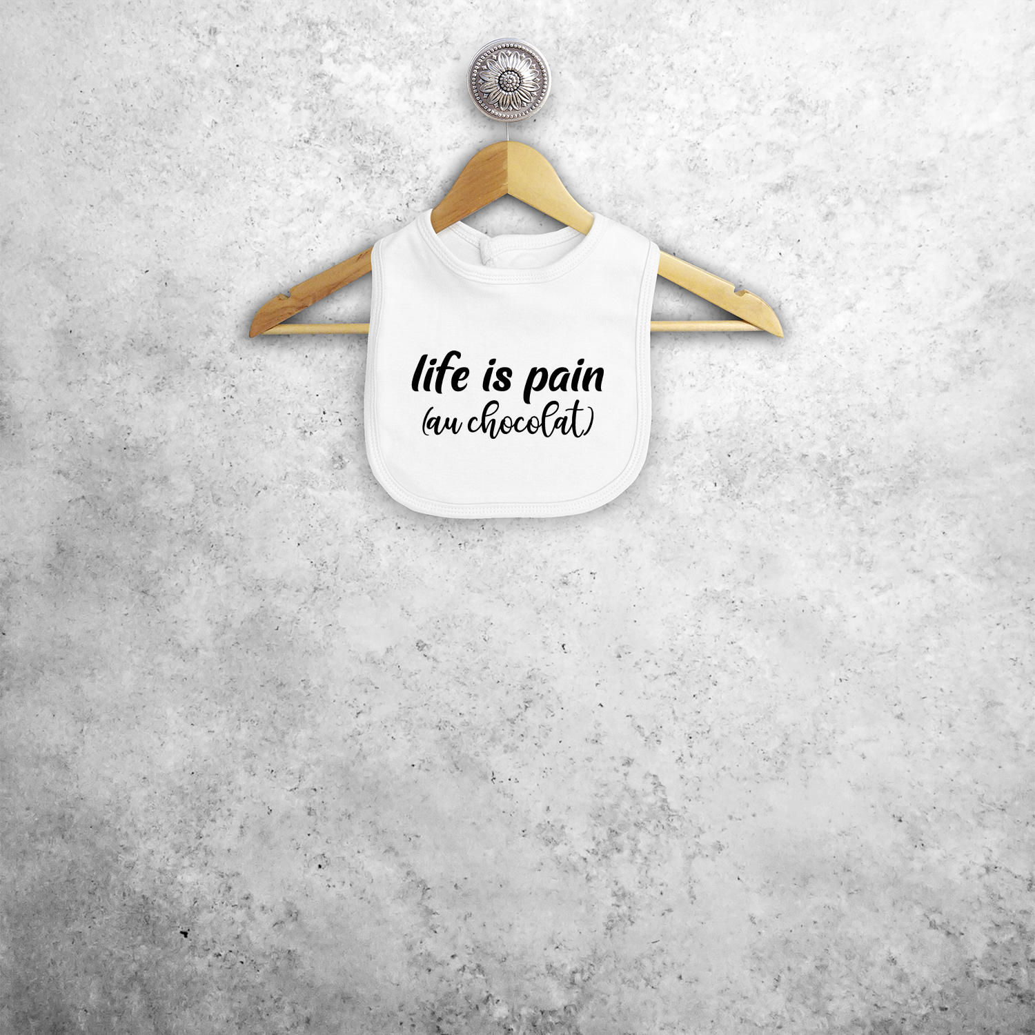 'Life is pain (au chocolat)' baby bib