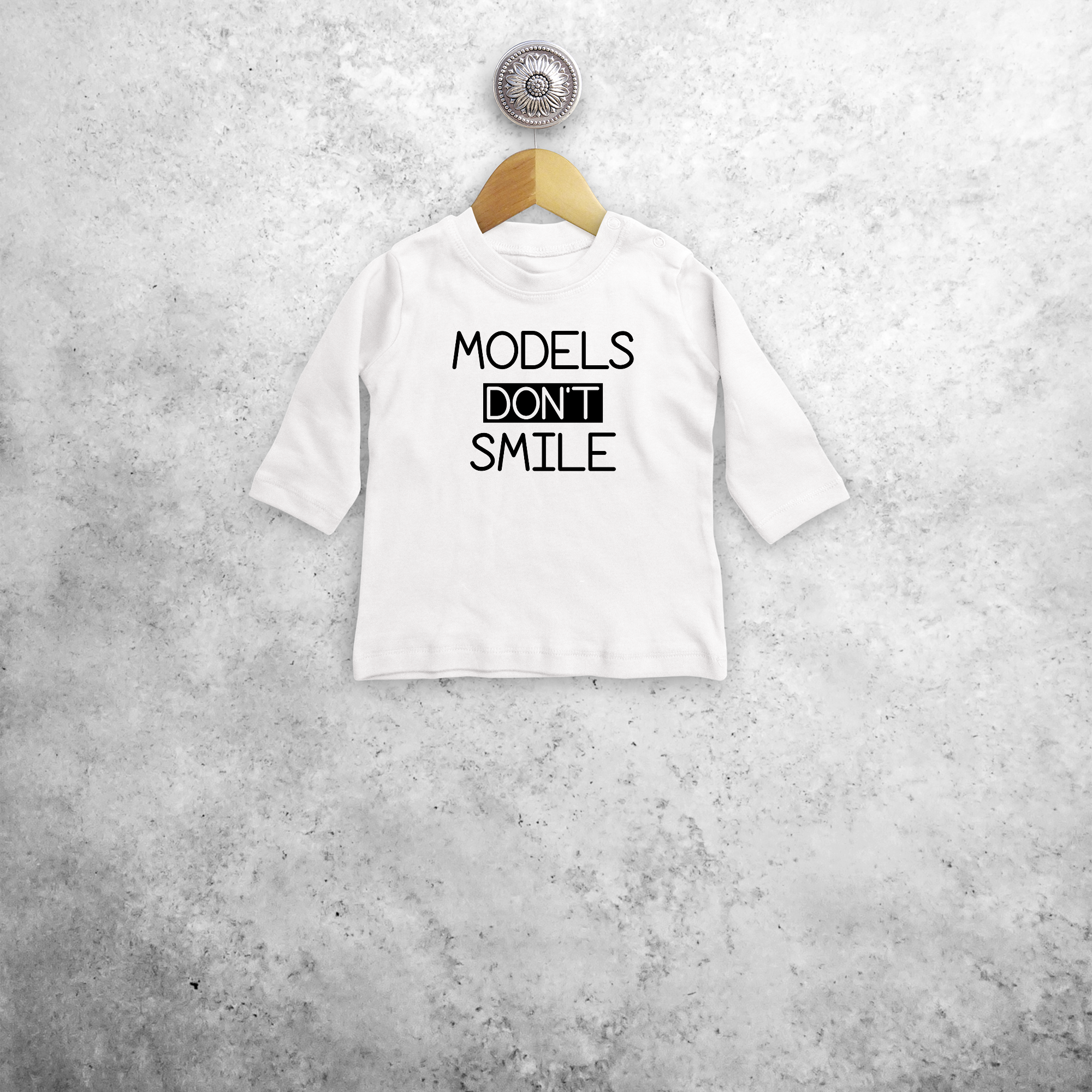 'Models don't smile' baby longsleeve shirt