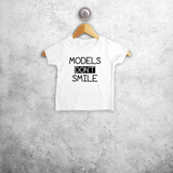 'Models don't smile' baby shortsleeve shirt