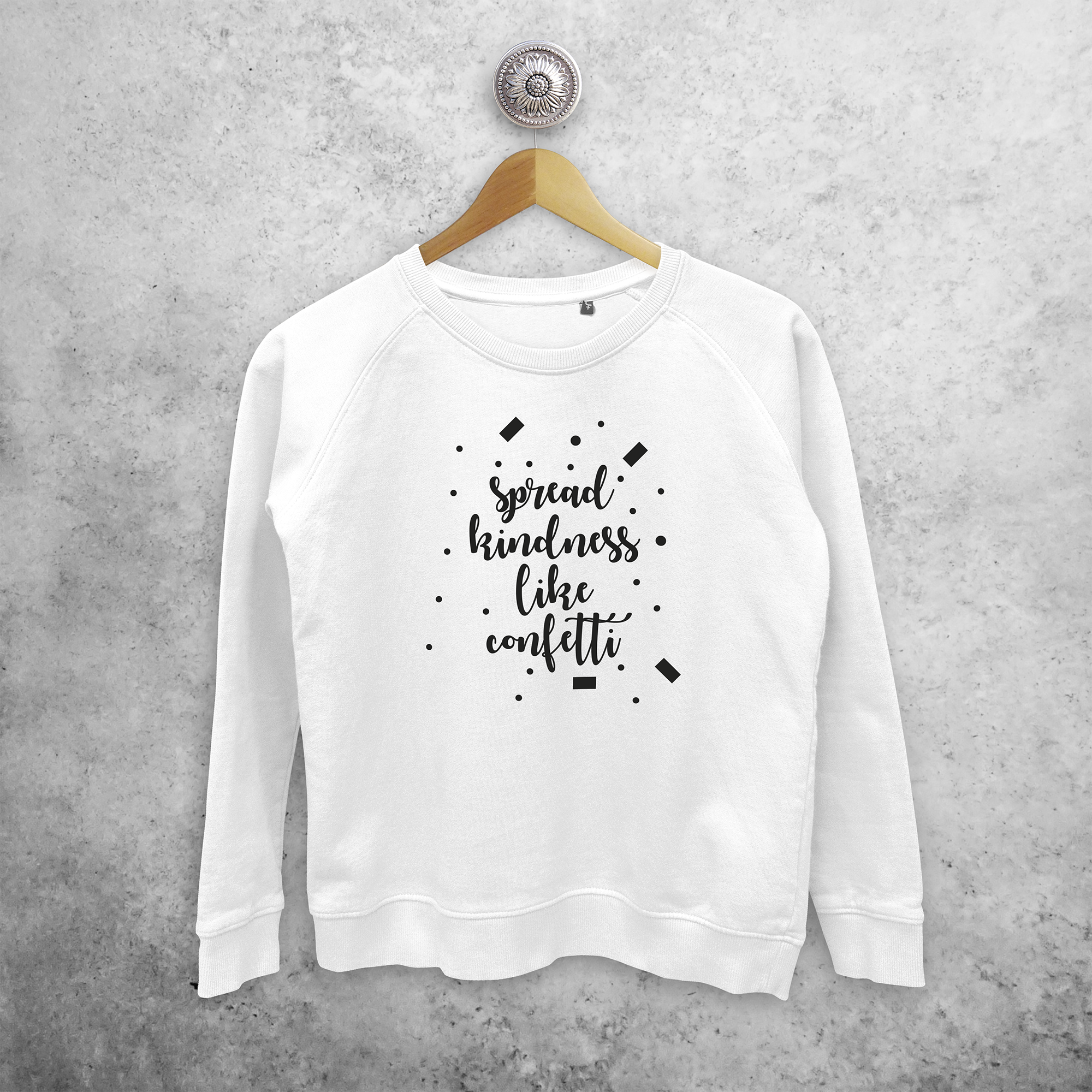 'Spread kindness like confetti' sweater