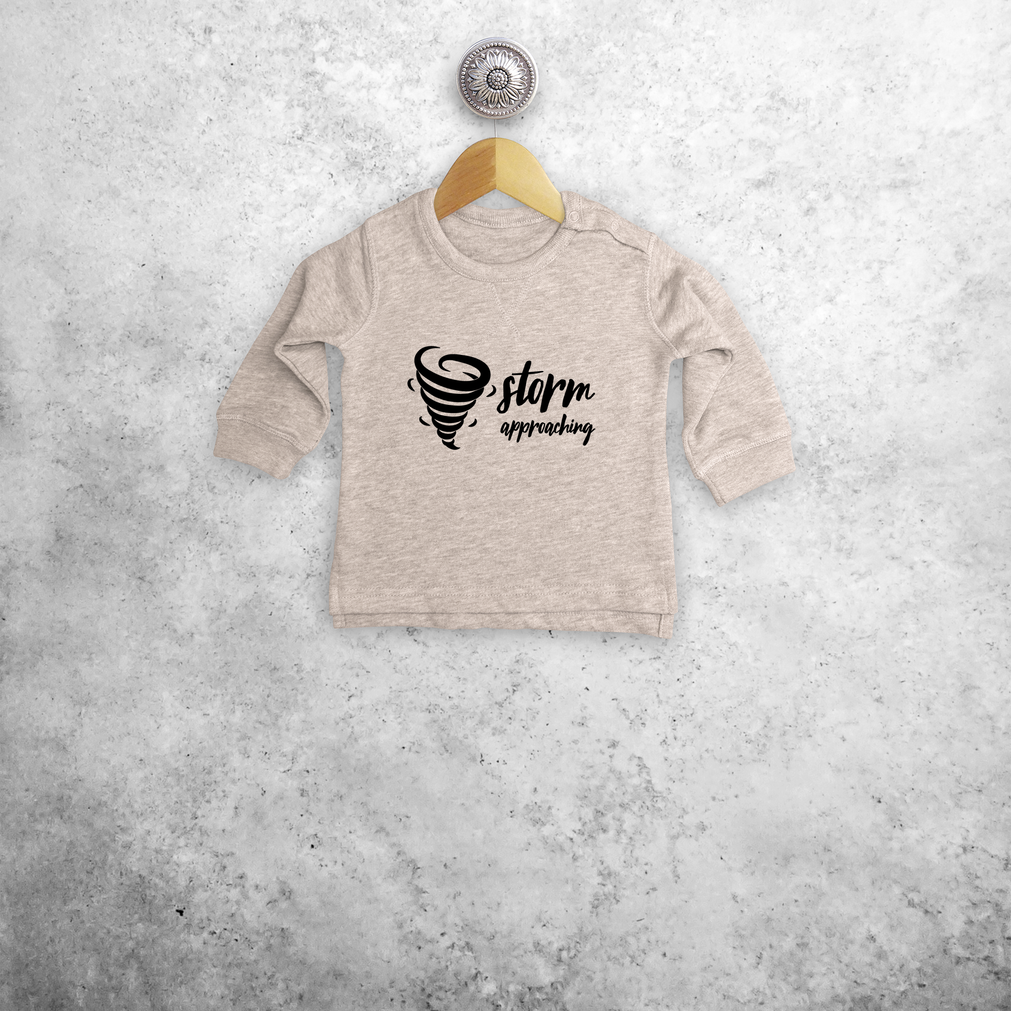 'Storm approaching' baby sweater